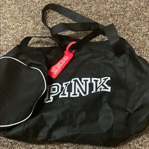 PINK Victoria's Secret Handbags - Never used pink duffel bag with tag
